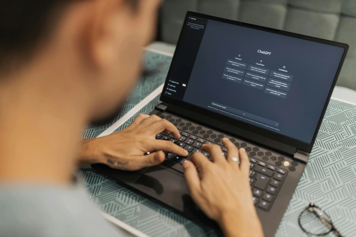Developer working on RPA bot configuration interface showing workflow automation steps, data mapping, and integration settings with business applications